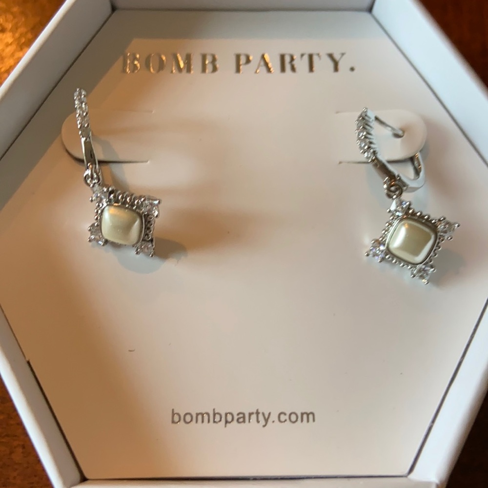 Bomb party new earrings in box